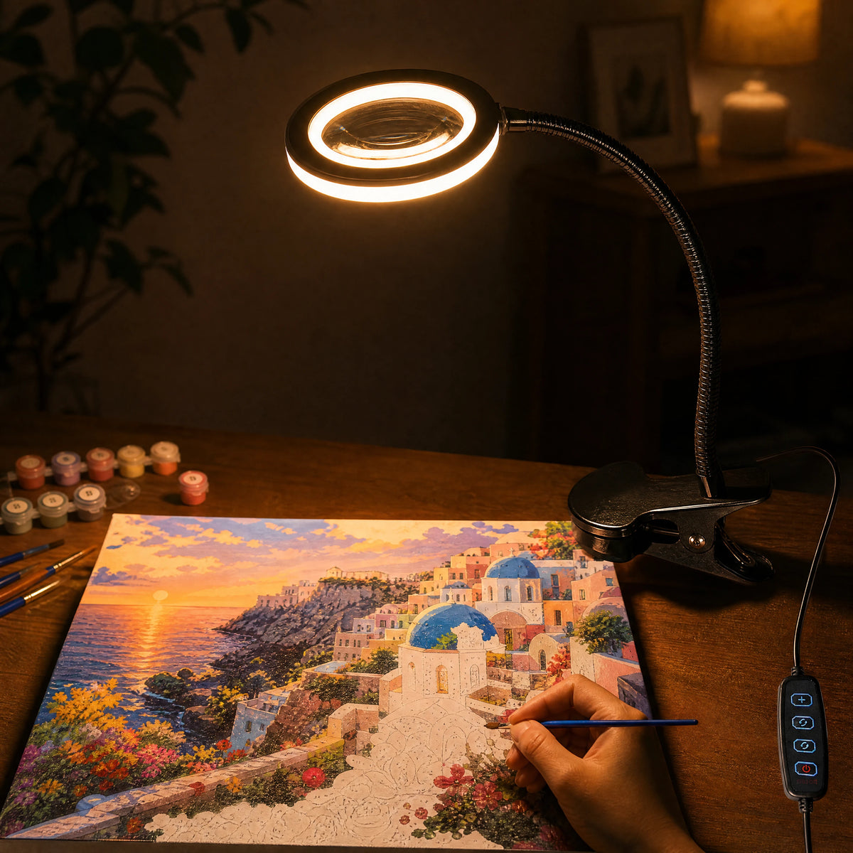 lamp in warm light mode over a canvas at night | LED Lamp with Clamp for Detail Painting