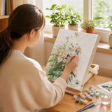 painting a numbered canvas on the easel by a bright window | Foldable Wooden Tabletop Easel